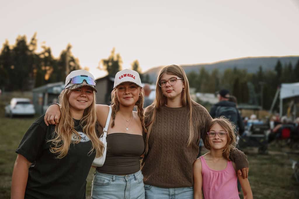 Outdoor gathering of friends at Friday Night Live event.